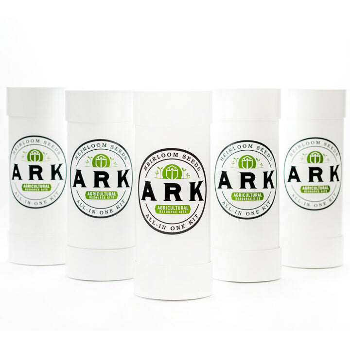 Five cylindrical white containers with green and black labels, each labeled 'ARK' and 'All-in-one heirloom seed kit'.