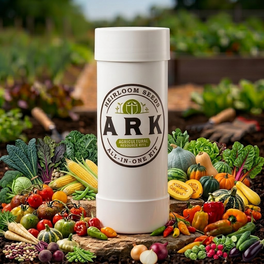 A white cylindrical ARK agricultural resource kit container stands upright on a log surrounded by a colorful assortment of fresh vegetables and fruits in a garden setting.