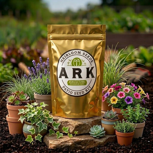 A gold resealable pouch labeled ARK Heirloom Seeds Patio Seed Kit stands on a stone in a garden setting, surrounded by small potted plants and flowers.